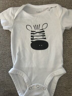 Hanes White Onesie with Black Zebra Face Graphic